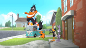 Daffy shows Bugs his parade float.