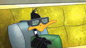 Daffy's 3D glasses shatter, due to a high note.