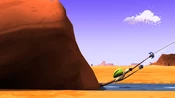 The boulder impacts Wile E.