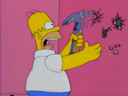 Homer con su martillo eléctrico
