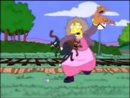 La Loca de los Gatos atacando a Lisa