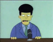 Scott con el pelo negro.