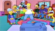 Homer durante la reunión de la asociación de armas.