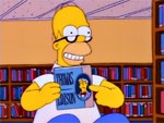 Homer con libro de Thomas Alva Edison