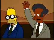Homer y Apu como jurados