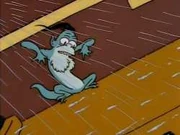 Un Gremlin aparece al costado del autobús