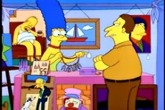 Marge vendiendo collares de huesitos