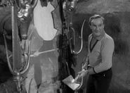 After Penny returns to the regular world Smith destroys the mirror.