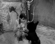 The Bloop takes Penny back to the mirror.