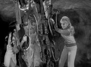 Penny & Judy straighten the mirror up the next day.