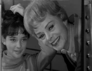 Back home, Penny decides to grow up and arrange her hair in an adult style.