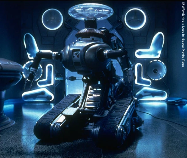 Lost in space robot. Робот с пилой игрушка. Robots джон пауэлл. Робот телевизор. Lost in space 1998 robot.