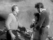 John finds Penny with Dr. Smith.