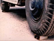Mb5.jpg (23 KB) Two regular Magic Boxes, each underneath a tire of an ice cream truck.