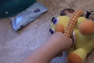 A Screenshot Of The Evil Woody Doll