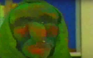 A Green Puppet Man
