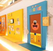 A Hey Duggee Centre With Chop Chop! Images Seen On The Left