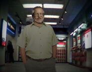 Dr. Bolé in a store of some kind.