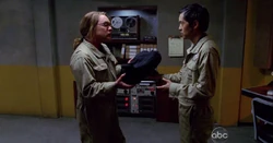  hands  his package to .