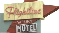 The Flightline motel's sign.