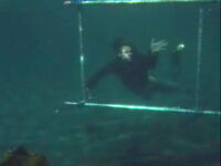  stunt double Jake Kilfoyle performing the underwater portion of 's  from "". The camera is visible at bottom left