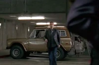  walks from his Bronco as he sees  after her trial ("")