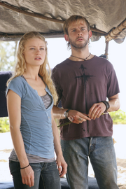  and Claire watch  return to camp