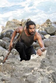 Sayid Climbing