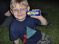 A young fan poses with his Apollo Bar in Lexington, KY