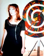 A backstage photo showing Natalya next to the spiral used in the music video.