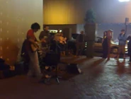 An image including a better look at the guitarist.