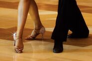 Two pairs of dancing legs, used by twenty6 to post "Dance For Hours a Day".