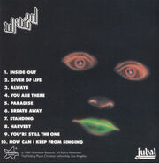 Ditto, back cover with a tracklist and band credit