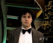 The person on the left in the music video.