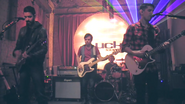 Picture of the band playing live.