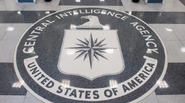 The most associated image with the song. It is the seal of the Central Intelligence Agency on the floor of the foyer at the CIA Headquarters.