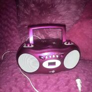 The main image largely associated with the song as it has been used in various uploads of the song. The image is a photo of a glitz and glitter boombox.