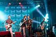 Picture of the band playing live.