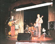 Picture of the band playing live.