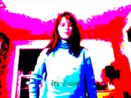 A screenshot of the original video, with green text, reading “it’s 2 am”.