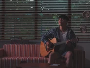 One of the frames of the music video of the re-release.