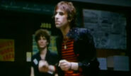 Image used by OP, a still from the original song’s Music Video.