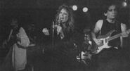 Picture of the band playing live.