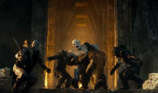 Azog dragged away in defeat in following the battle