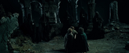 The Hobbits confront the Nazgûl on Weathertop.