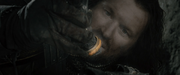 Isildur beholds the One Ring after cutting it off Sauron's hand.
