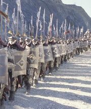 An Easterling army assembled for battle in full uniform with shields and spears