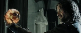 Aragorn reveals himself to Sauron through the palantír