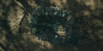 Sauron and his troops surround Adar after killing him