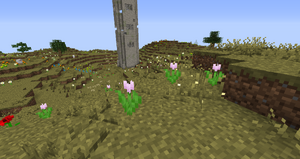 A ruined tower in a flowers variant of the Lone-Lands.